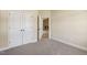 Cozy bedroom with double closets leading to a stone fireplace room at 258 Thistle Ct, Sanford, NC 27332