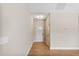 Bright entryway with white front door and hardwood floors at 258 Thistle Ct, Sanford, NC 27332