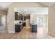 Modern kitchen with gray cabinetry, granite countertops and stainless steel appliances at 258 Thistle Ct, Sanford, NC 27332