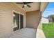 Back porch with sliding glass doors, and outdoor space, that offers a relaxing view at 258 Thistle Ct, Sanford, NC 27332