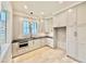 Butler's pantry with light gray cabinets and quartz countertops at 3407 Churchill Rd, Raleigh, NC 27607