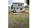 Home with fenced backyard featuring a patio and convenient access to the house at 605 Quarry St, Raleigh, NC 27601