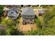 A bird's eye view of the backyard and rear exterior of the home showcasing a compact yard at 605 Quarry St, Raleigh, NC 27601