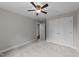 Neutral bedroom features carpeting and closet space at 605 Quarry St, Raleigh, NC 27601