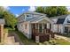 Attractive two-story home with a quaint front porch and freshly landscaped yard at 605 Quarry St, Raleigh, NC 27601