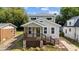 Lovely two-story home boasting a quaint front porch and beautifully landscaped yard at 605 Quarry St, Raleigh, NC 27601
