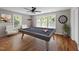 Game room features pool table, hardwood floors, natural light and a dart board at 605 Quarry St, Raleigh, NC 27601