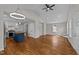 Spacious open concept living area leading to kitchen, hardwood floors and neutral paint at 605 Quarry St, Raleigh, NC 27601