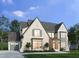 Charming two-story home with stone facade, gray roof, and manicured lawn at 217 Dublin Rd, Raleigh, NC 27609