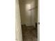 Small storage closet with shelving and tile flooring at 253 Plains Dr # 264, Burlington, NC 27217