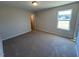 Spacious bedroom with natural light and neutral carpeting at 120 Wild Turkey Way, Lillington, NC 27546