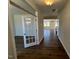Inviting foyer with hardwood floors and a view of the open living space at 120 Wild Turkey Way, Lillington, NC 27546