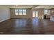 Open-concept living room with hardwood floors and natural light at 120 Wild Turkey Way, Lillington, NC 27546