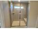 Modern tiled shower enclosure with built-in bench at 120 Wild Turkey Way, Lillington, NC 27546