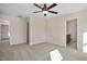 Large bedroom with ceiling fan and two entrances to baths at 211 Wild Turkey Way, Lillington, NC 27546
