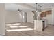 Modern kitchen with island, pendant lighting, and hardwood floors at 211 Wild Turkey Way, Lillington, NC 27546