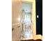 This bathroom features a bright interior, striking patterned tile flooring, and stylish fixtures at 2501 Kenmore Dr, Raleigh, NC 27608