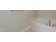 A relaxing bathroom with a soaking tub, perfect for unwinding after a long day at 67 Decatur Dr, Fuquay Varina, NC 27526
