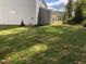Large backyard featuring green grass and ample space for outdoor enjoyment at 3113 Petrea Ct # 38, Angier, NC 27501