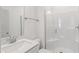 Modern bathroom with white vanity, quartz countertops, and glass-enclosed shower at 3113 Petrea Ct # 38, Angier, NC 27501
