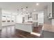 Well-lit kitchen featuring a large island, stainless steel appliances, and an open layout at 3113 Petrea Ct # 38, Angier, NC 27501