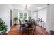 Elegant dining room featuring hardwood floors and ample natural light at 135 Deep Creek, Rougemont, NC 27572