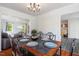 Elegant dining room with hardwood floors and views into the living and kitchen areas at 135 Deep Creek, Rougemont, NC 27572