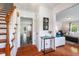 Welcoming foyer with hardwood floors, staircase, and access to living spaces at 135 Deep Creek, Rougemont, NC 27572