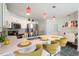 Contemporary kitchen with quartz countertops, stainless steel appliances, and a breakfast bar with seating at 135 Deep Creek, Rougemont, NC 27572