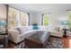 Spacious living room featuring ample natural light and stylish decor at 135 Deep Creek, Rougemont, NC 27572