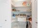 Walk-in pantry with ample shelving, drawer storage, and a wire basket at 135 Deep Creek, Rougemont, NC 27572