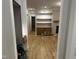 View of living room from hallway, showcasing hardwood floors at 1008 Frank Bailey Rd, Wake Forest, NC 27587