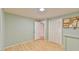 Bedroom featuring a closet with louvered doors and light hardwood floors at 128 Dixie Dr, Chapel Hill, NC 27514