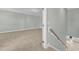 Neutral-colored basement with neutral carpet flooring, light-colored walls, and plenty of space at 3109 Petrea Ct # 39, Angier, NC 27501