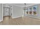 Bright dining area showcasing expansive windows and modern lighting at 3109 Petrea Ct # 39, Angier, NC 27501