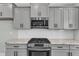 Well-equipped kitchen with stainless steel appliances, granite countertops, and white subway tile backsplash at 3109 Petrea Ct # 39, Angier, NC 27501