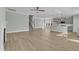Open floor plan featuring a living room and kitchen with abundant natural light at 3109 Petrea Ct # 39, Angier, NC 27501