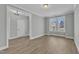 Spacious living room featuring large windows, crown molding, and ample natural light at 3109 Petrea Ct # 39, Angier, NC 27501