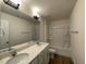 Bathroom features double sink vanity with granite countertop, modern fixtures, and ample lighting at 490 Traditions Grande Blvd # 27, Wake Forest, NC 27587