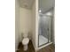 Bathroom features tiled shower, toilet, and neutral color scheme, creating a clean and functional space at 490 Traditions Grande Blvd # 27, Wake Forest, NC 27587