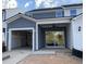 New construction features attached garage, covered patio, gray and white color scheme at 490 Traditions Grande Blvd # 27, Wake Forest, NC 27587