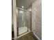 Modern shower with glass door, tiled walls, and built-in seating, offering a spa-like experience at 490 Traditions Grande Blvd # 27, Wake Forest, NC 27587