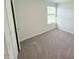 Bedroom with gray carpet and natural light from a window at 9229 Kitchin Farms Way # 427, Wake Forest, NC 27587