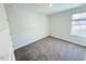 Bedroom with gray carpet and natural light from a window at 9229 Kitchin Farms Way # 427, Wake Forest, NC 27587