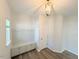 A bright mudroom features built-in storage, hooks and hardwood floors at 9229 Kitchin Farms Way # 427, Wake Forest, NC 27587