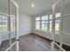 Sun-filled office featuring natural light and beautiful hardwood floors at 9229 Kitchin Farms Way # 427, Wake Forest, NC 27587