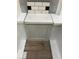 Selection of grey backsplash tile, countertop, cabinet, and wood floor samples at 9229 Kitchin Farms Way # 427, Wake Forest, NC 27587