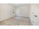 Bright bedroom with carpet flooring and double doors at 90 Trescott St, Smithfield, NC 27577