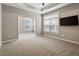 Spacious bedroom with neutral color palette and carpet flooring at 113 Pinot Ct, Chapel Hill, NC 27517