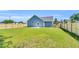 Home featuring a fenced-in backyard and newly installed patio perfect for outdoor entertaining at 306 E Godwin St, Dunn, NC 28334
